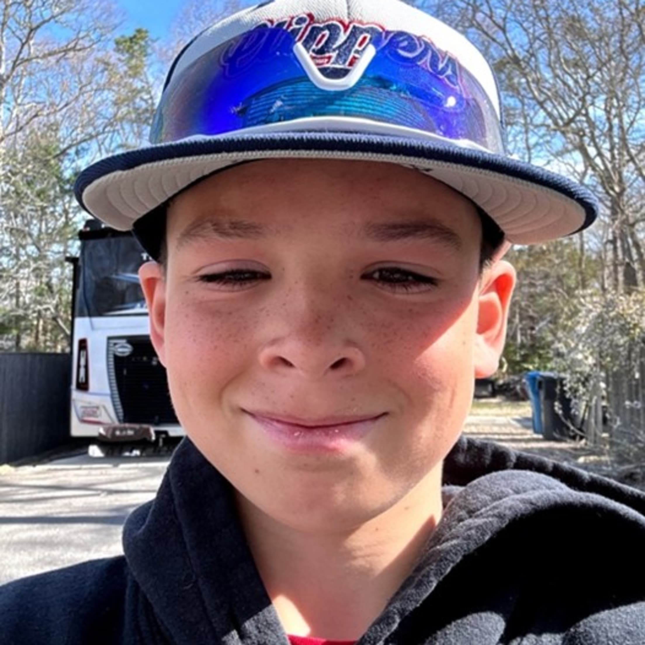 Falmouth Commodores bat kid Sebastian Roman