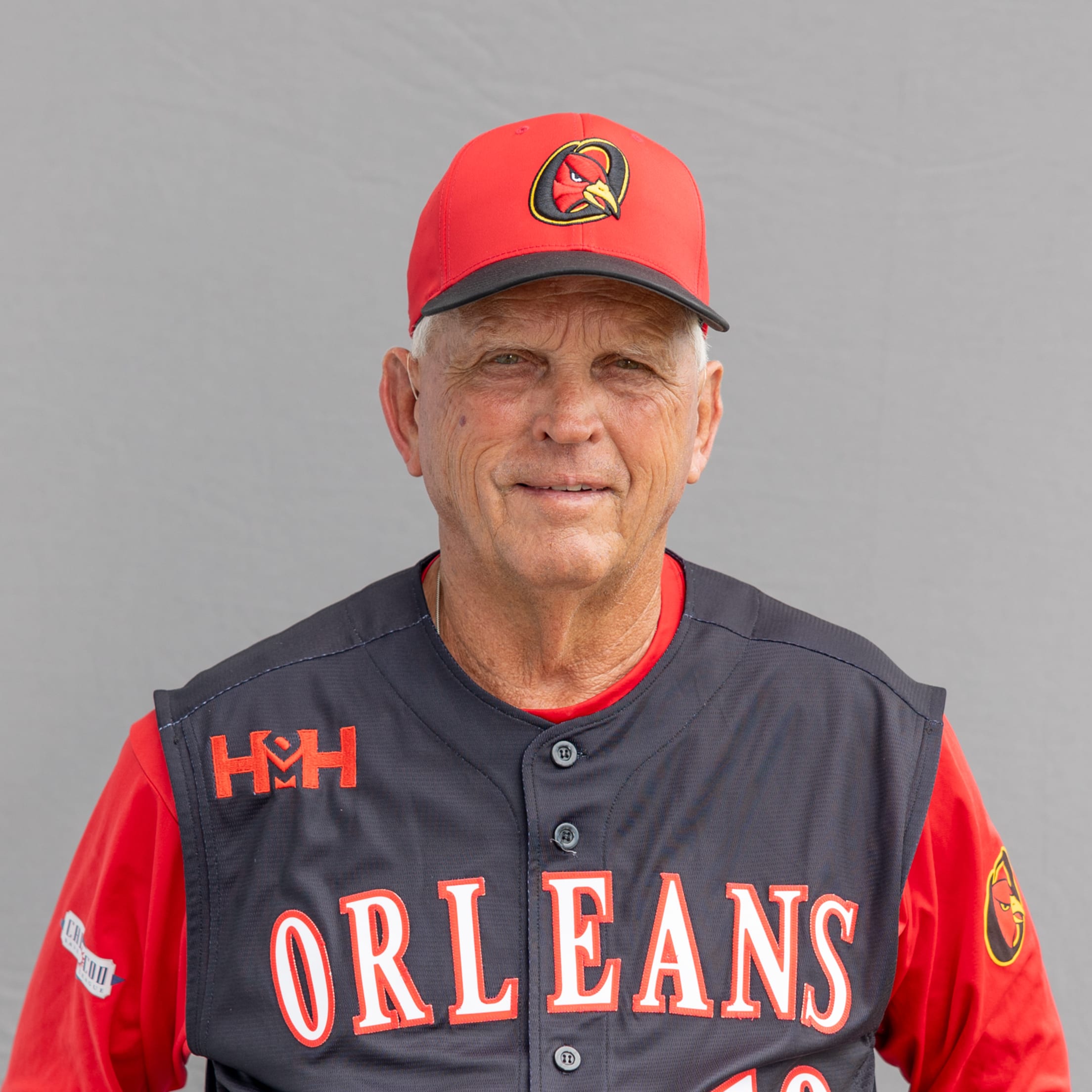 Headshot of Orleans pitching coach Jim Lawler