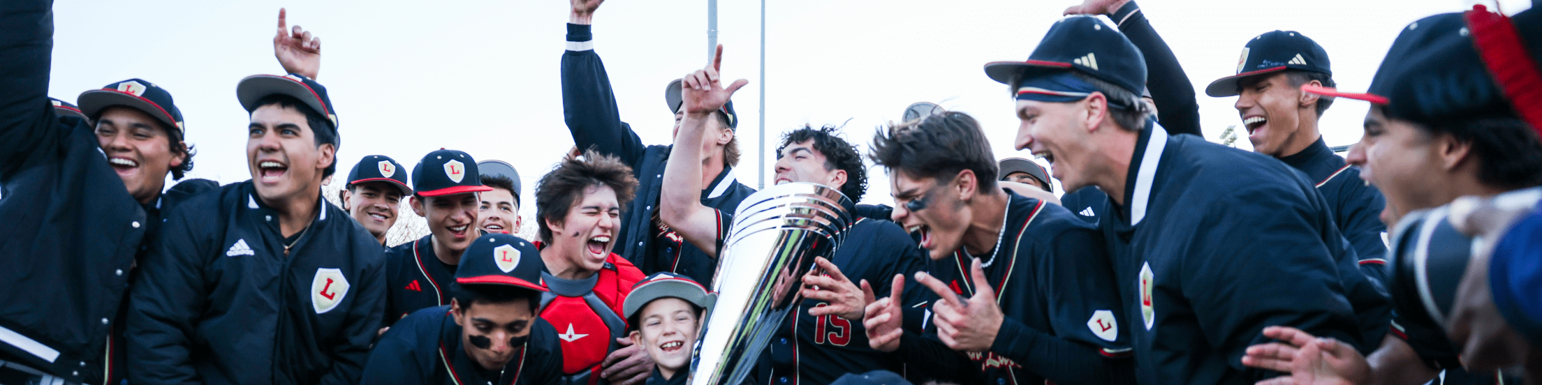 Players celebrating with a trophy
