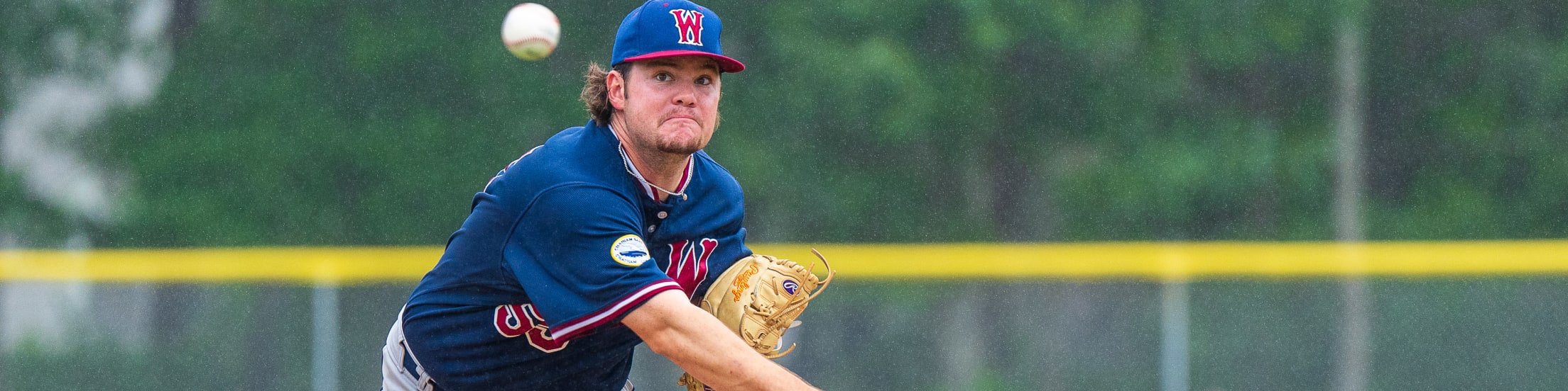 Wareham Gatemen pitcher delivers a ball that is now mid-flight.