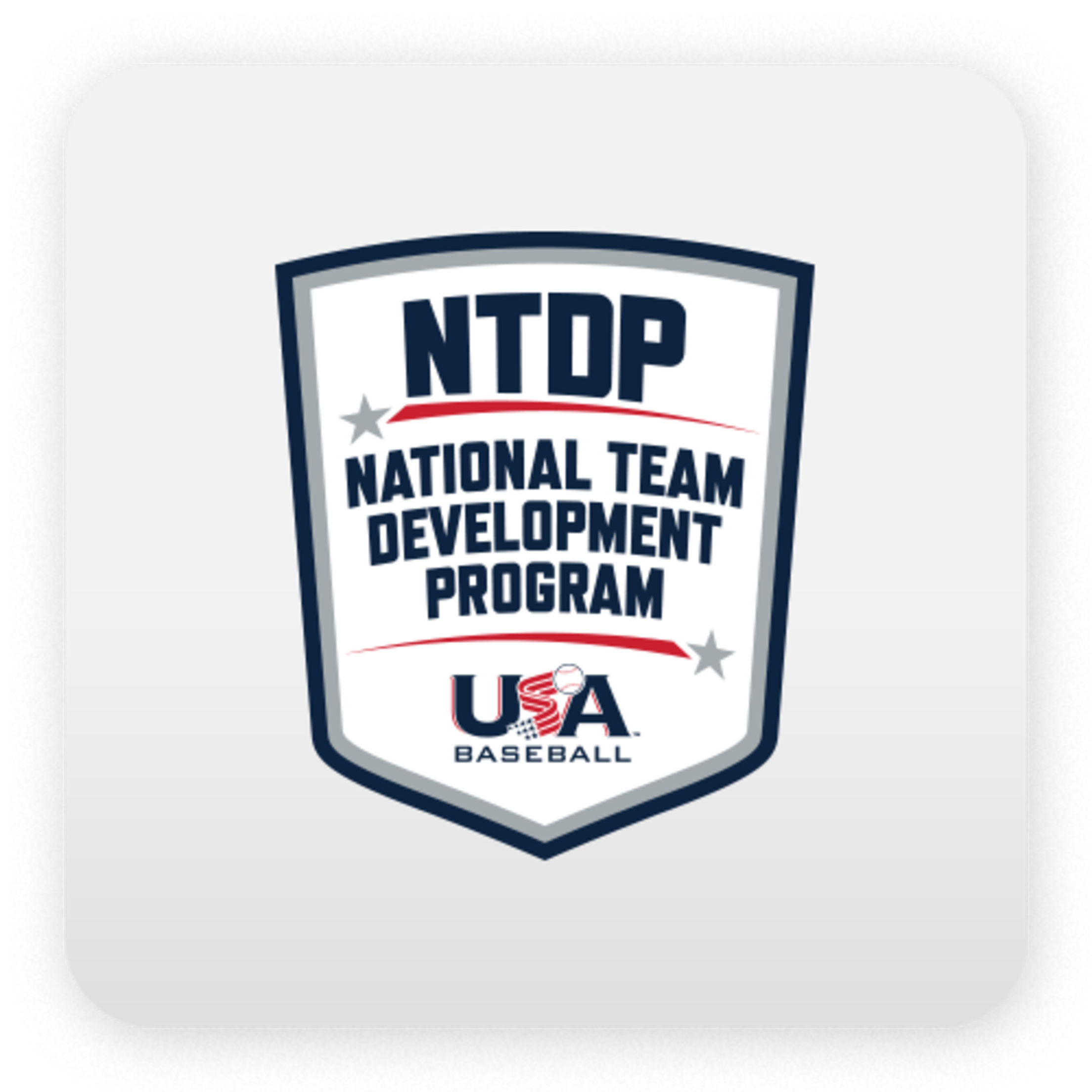A white logo that says "National Team Development Program" as well as "NTDP"