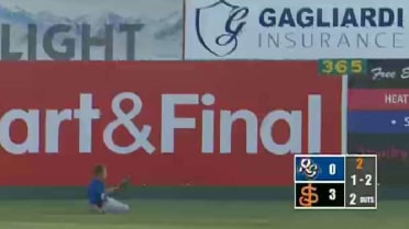 Quakes' Kendall makes a sliding catch in center
