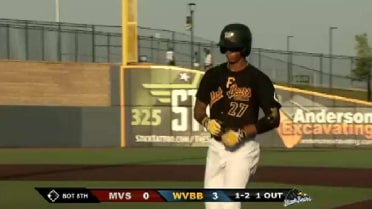 West Virginia's Santos delivers an RBI single