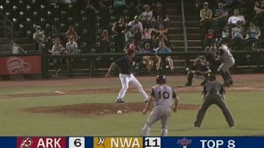 Arkansas' Bishop brings one home with a double