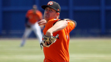 Hess flirts with no-hitter in Tides' rout
