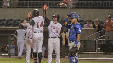 Perez Sets Pace, Lewis Homers in Travs Win