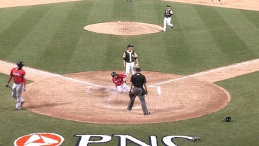 Flores scores on a passed ball to give PawSox lead