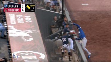 Dodgers' Vargas hangs on for the out