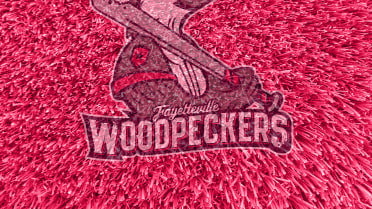 Woodpeckers Knock Off Keys with Five-Run Ninth