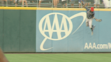 Jacksonville's Harrison climbs wall for catch