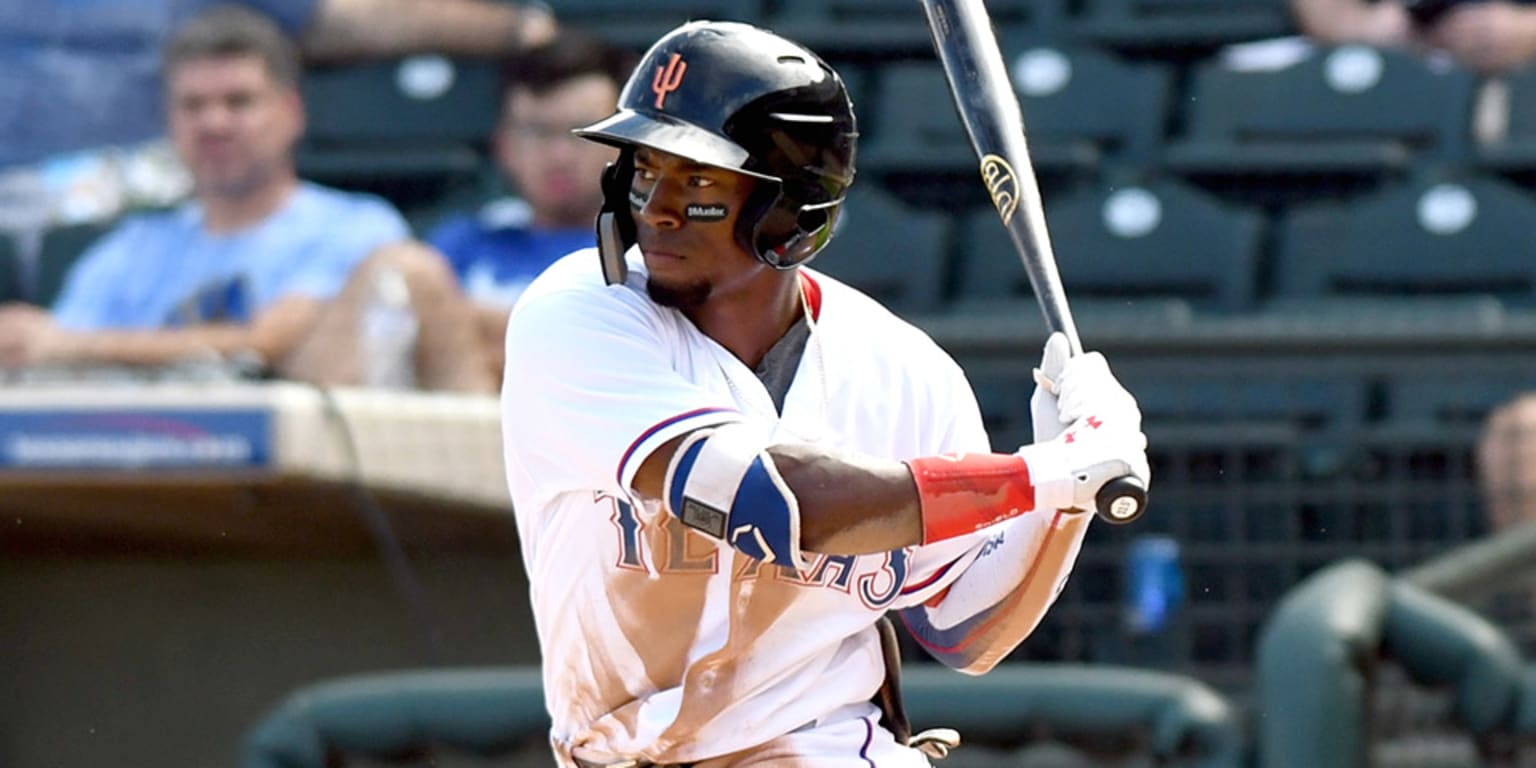 Texas Rangers' Julio Pablo Martinez hops on a cycle for Surprise ...