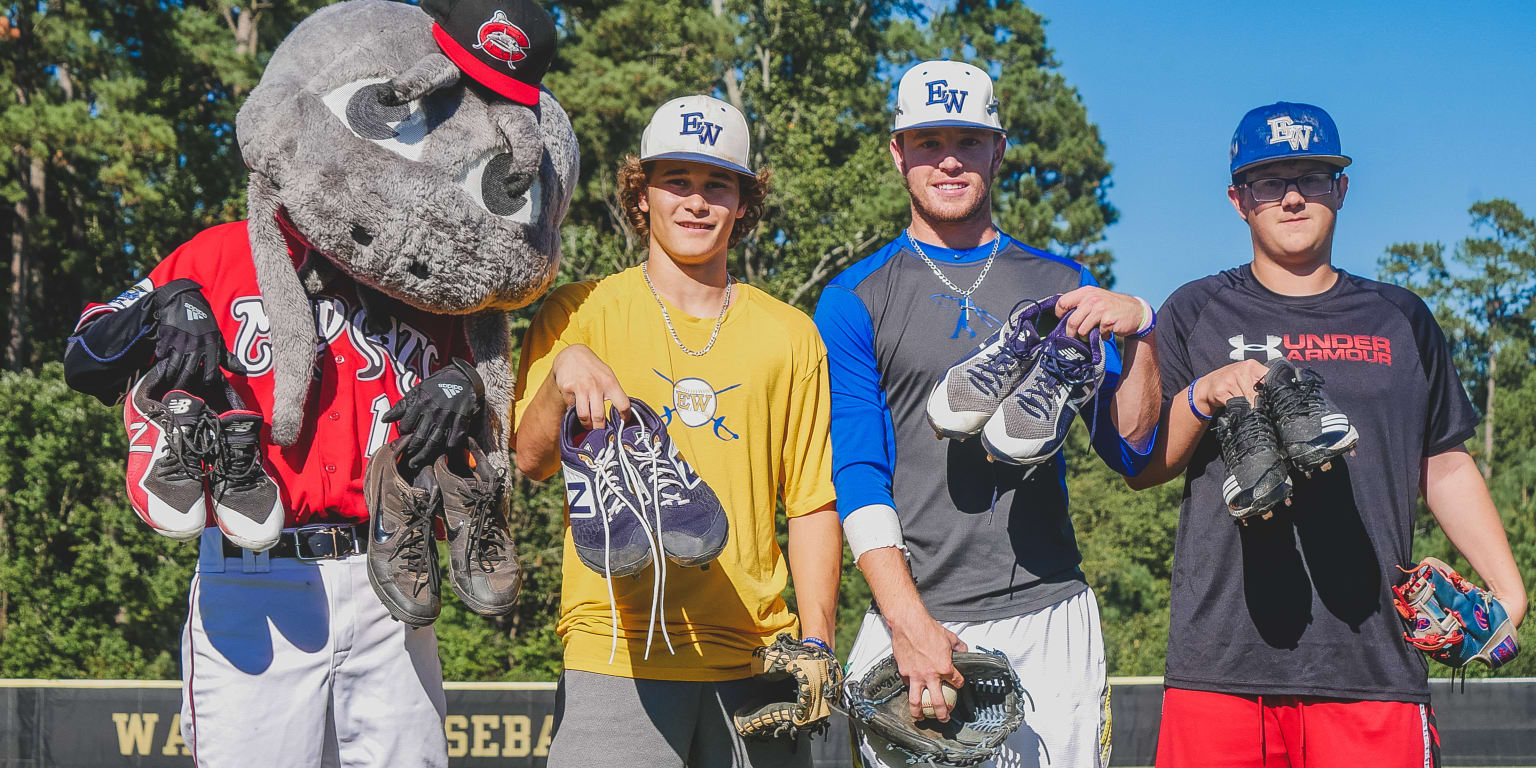Mudcats Donate Baseball Equipment to East Wake High School Mudcats