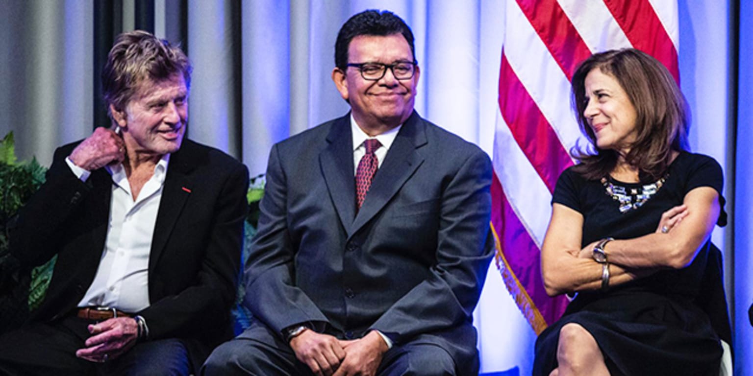 Fernando Valenzuela with wife, Linda and new baby are leaving San