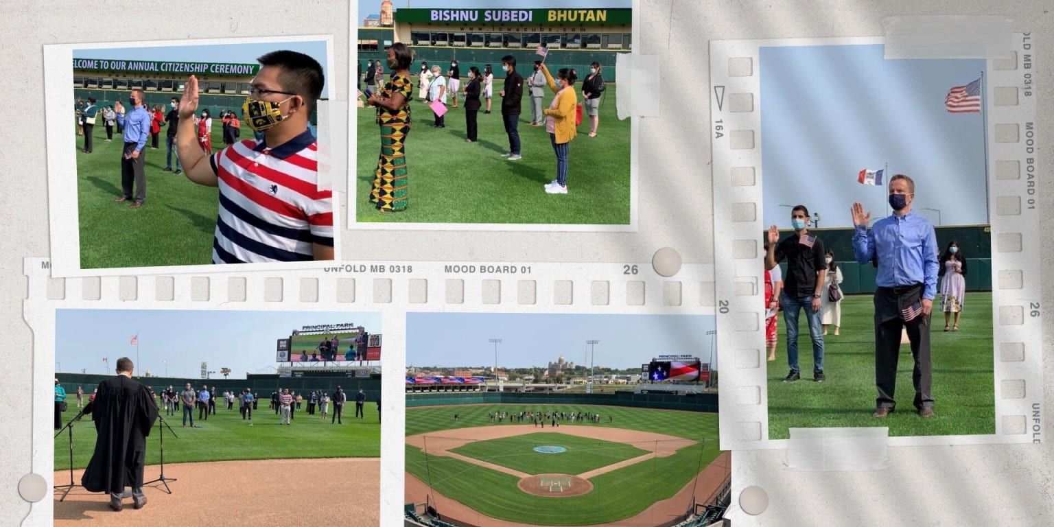 32 New Americans celebrate their Oath of Citizenship at Principal Park with  the Iowa Cubs