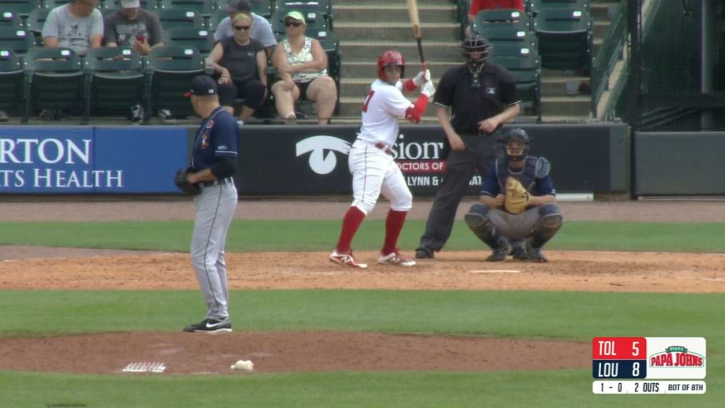 Reds Hall of Famer Barry Larkin works with Blue Wahoos