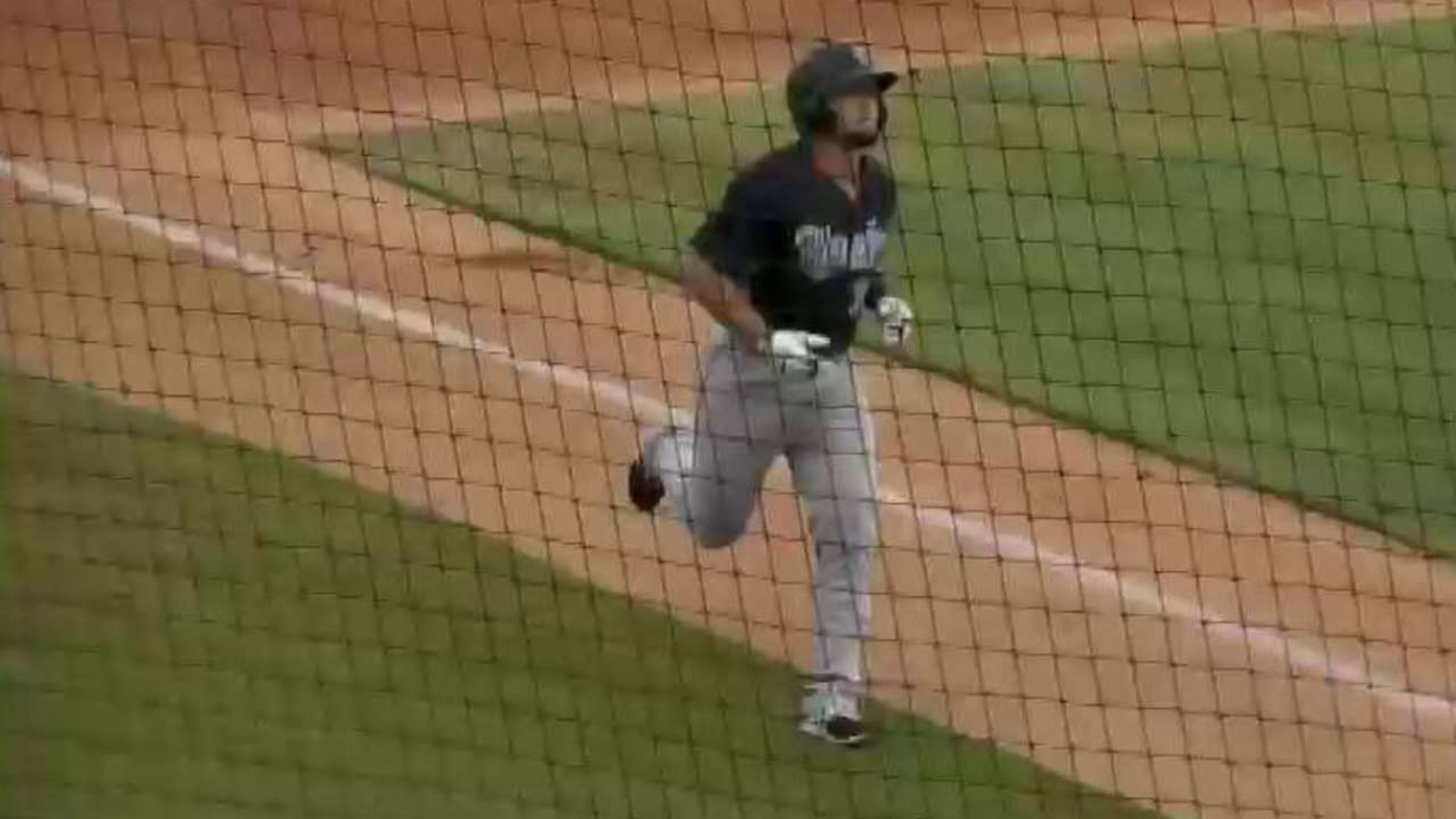 Download Fernando Tatis Jr. delivering a home run swing Wallpaper