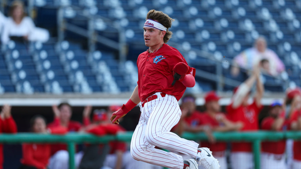 Phillies catching prospect Kehden Hettiger slides into home plate safely to score a run for the Clearwater Threshers.