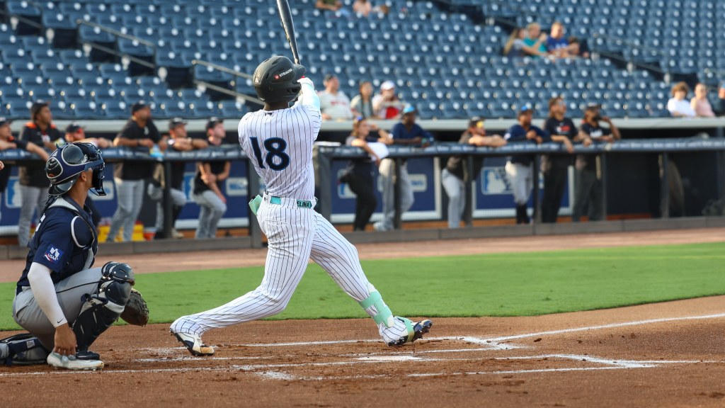 Wilberson De Peña launches the first Single-A pitch he sees over the left field wall.