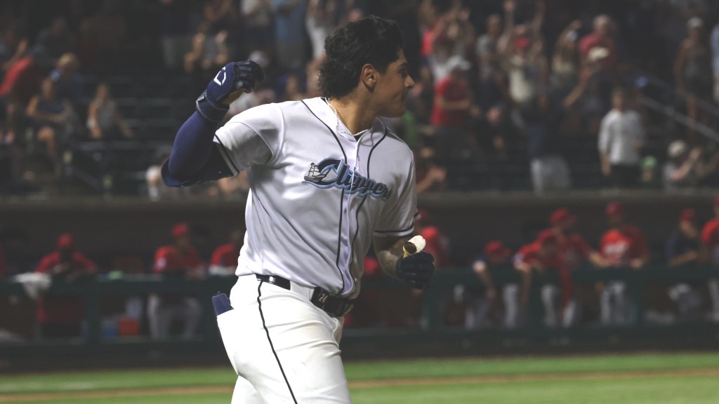 Ralphy Velazquez celebrates after delivering a walk-off winner for the Clippers on Tuesday