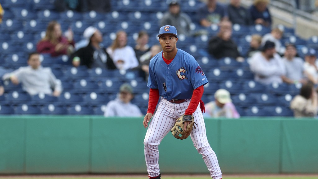 Phillies infield prospect Robert Phelps readies for a play in a Threshers game.