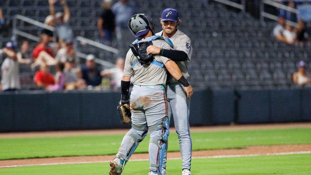 Jack Sellinger celebrates with catcher Ryan Ignoffo after Pensacola's 3-2 win on Tuesday.