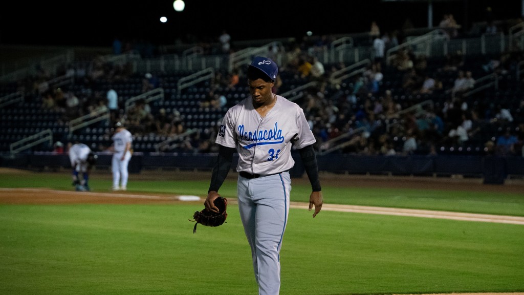 Blue Wahoos starting pitcher Eliazar Dishmey dejectedly walks off the field after allowing six runs, matching his most this season, in a four-inning outing that led to the Biloxi Shuckers 8-3 win Thursday to clinch the Southern League divisional series.