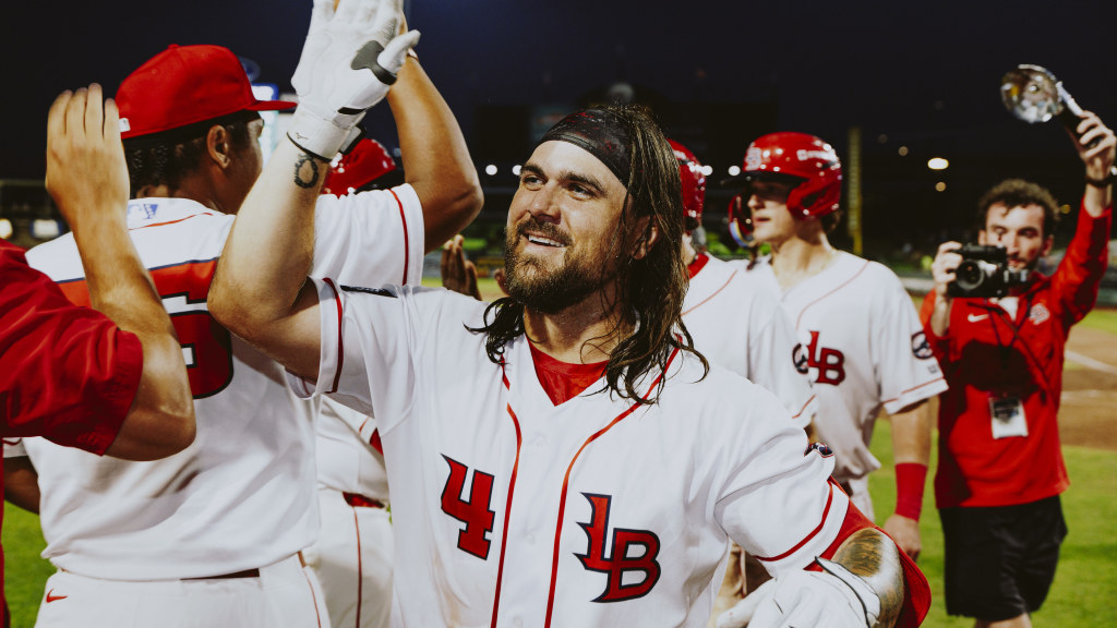 Michael Chavis takes the congratulations after his walk-off grand slam against Omaha.
