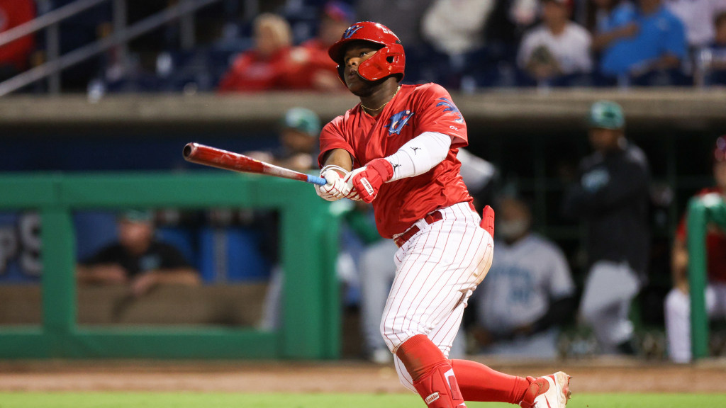 Phillis #6 prospect Aroon Escobar admires a long home run during a comeback win for the Clearwater Threshers.