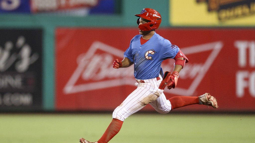 Phillies infield prospect Robert Phelps runs out a double in a game for the Clearwater Threshers
