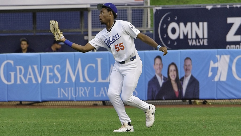 Tulsa right fielder Josue De Paula reaches to make a catch during Wednesday's loss to Corpus Christi at ONEOK Field.