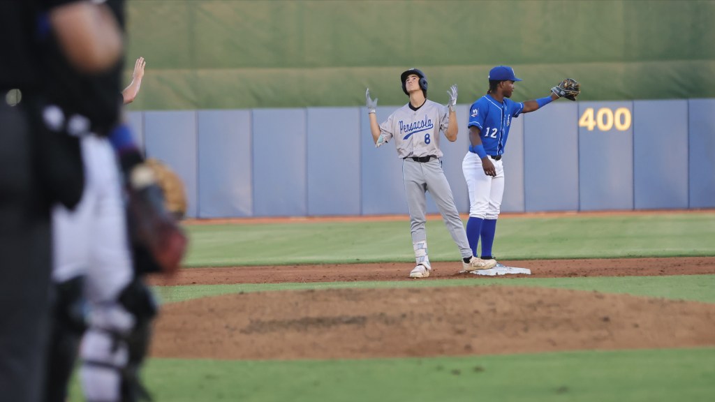 Adrian Santana celebrates after one of his two run-scoring doubles in Pensacola's 9-4 win on Friday night.
