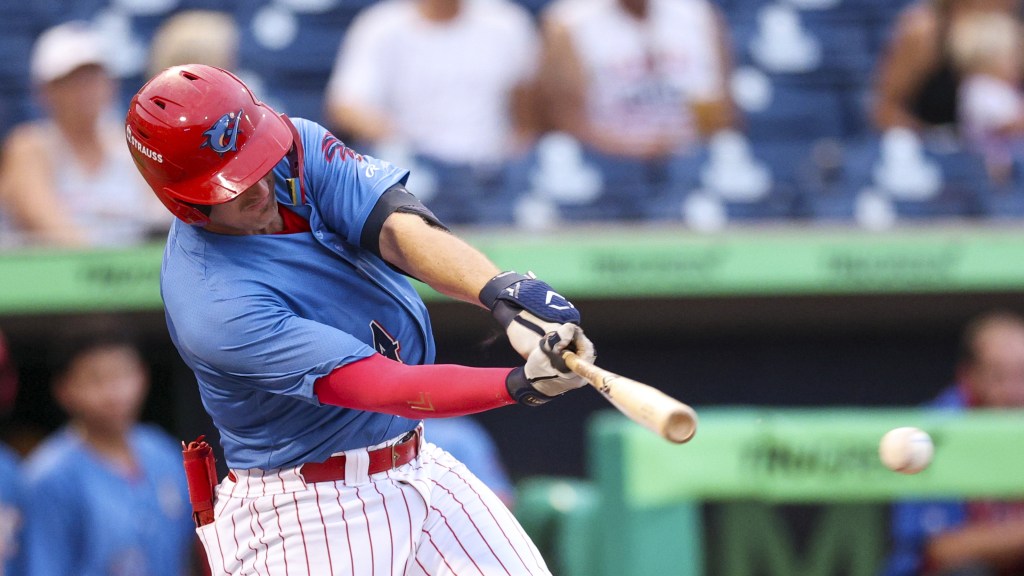 Phillies outfield prospect Jonathan Hogart connects on a hit for the Clearwater Threshers.