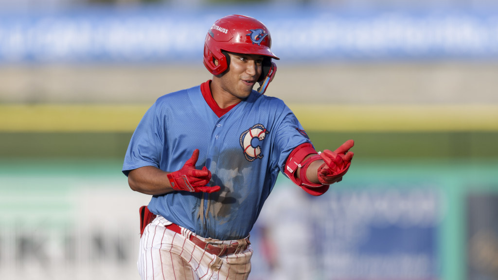 Phillies 19th-round pick Robert Phelps celebrates a home run as he rounds the bases for the Clearwater Threshers.