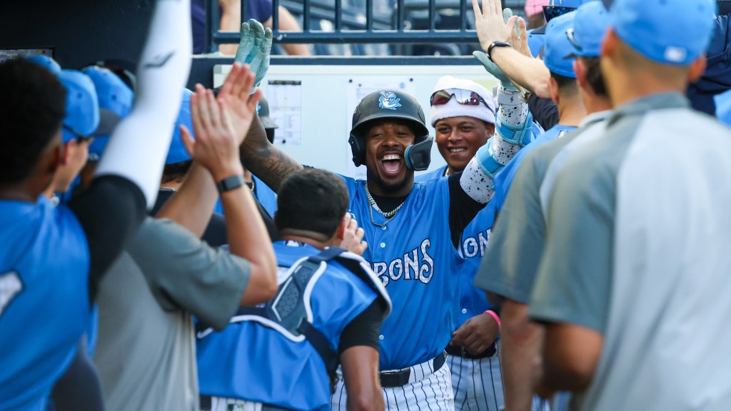 Brando Mayea celebrates with teammates after hitting his first homer of the season.