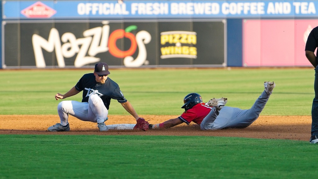Tulsa second baseman Taylor Young applies a tag during Sunday's matchup with Wichita at ONEOK Field.