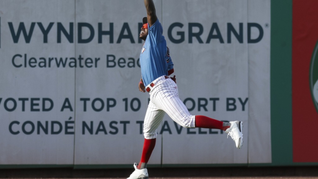 Phillies outfield prospect TJayy Walton makes a leaping grab in left field during a Threshers win.