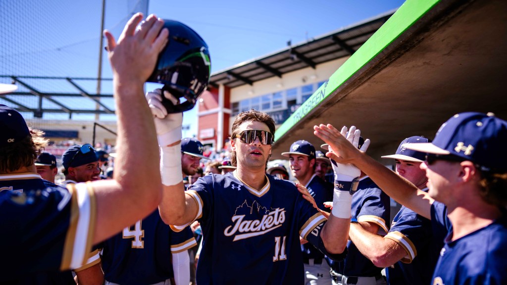 Georgia Tech's Ryan Zuckerman is greeting by teammates after blasting one of his pair of 2-run homers in the Oct. 17 Fall Ball exhibition game against Alabama at Blue Wahoos Stadium.