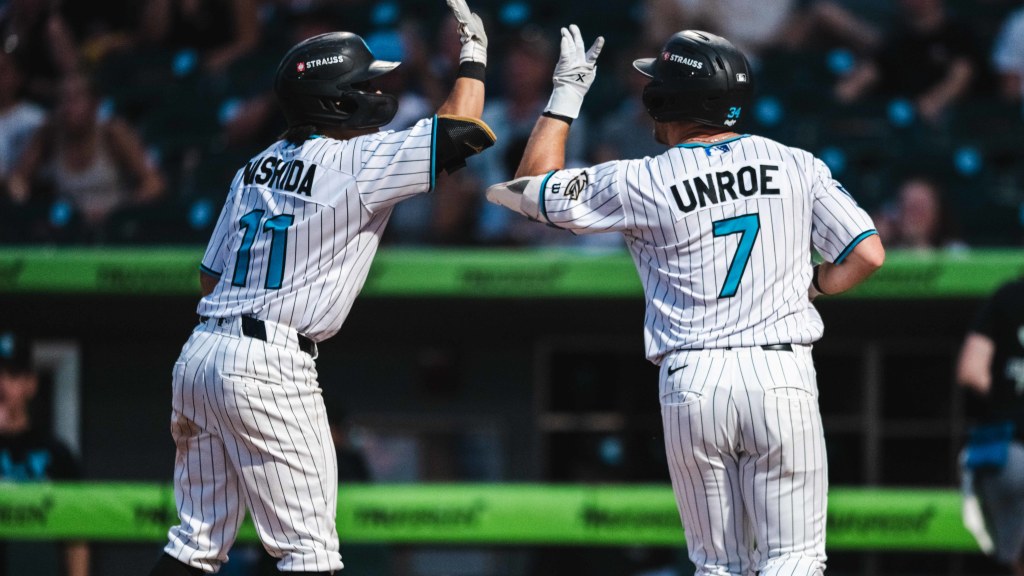 Rikuu Nishida congratulates Riley Unroe after his fifth inning Home Run. Unroe added a double and a walk in the ballgame.