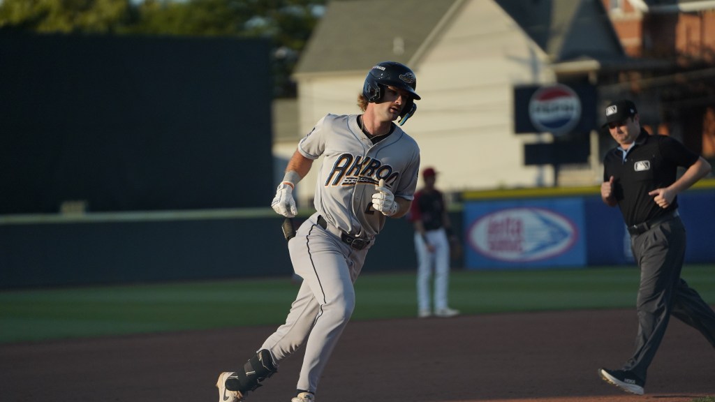 Alex Mooney rounds third after hitting a solo homer.