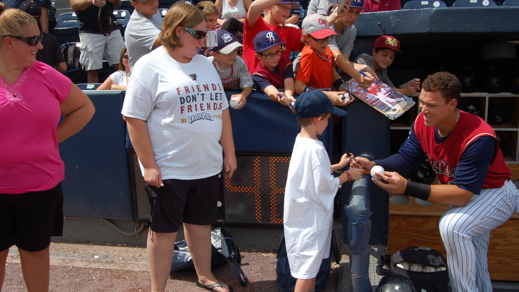 Future three-time AL MVP Aaron Judge signing autographs at PNC Field in 2016.