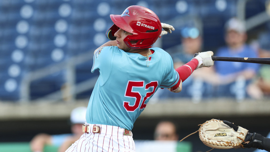 Phillies prospect Nolan Beltran connects on an RBI hit in a Beach Dogs game at BayCare Ballpark.