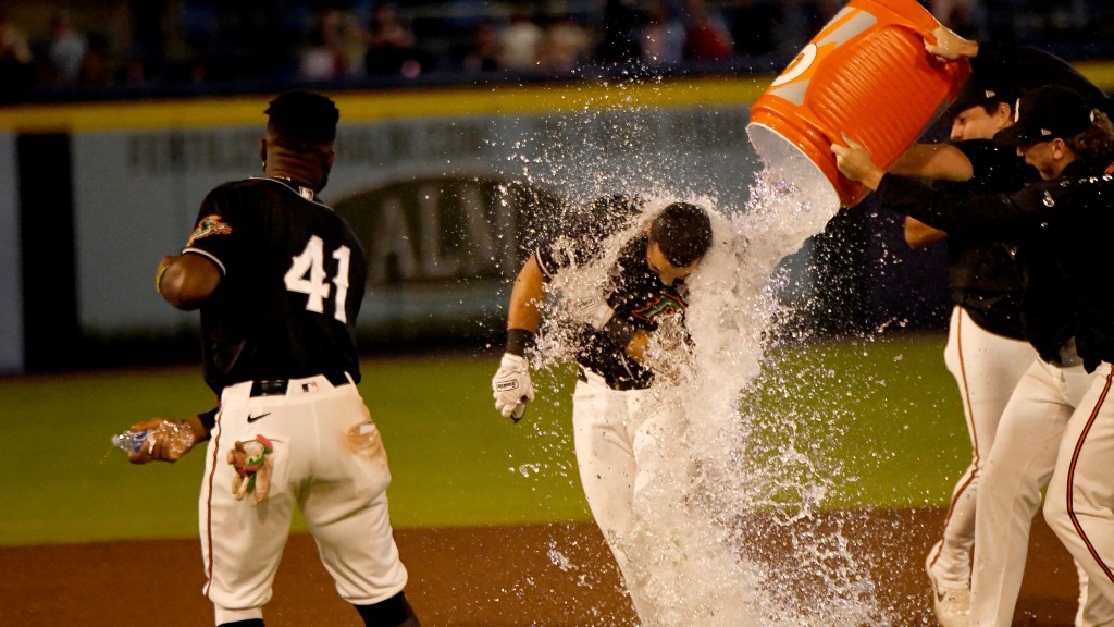 Christian Encarnacion-Strand doused in water.