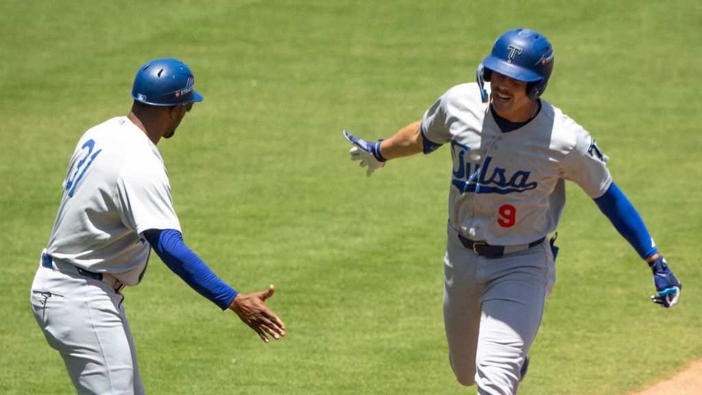 Chris Newell rounds third after hitting a home run in the second inning that gave Tulsa a temporary lead in Sunday's series finale in Wichita.