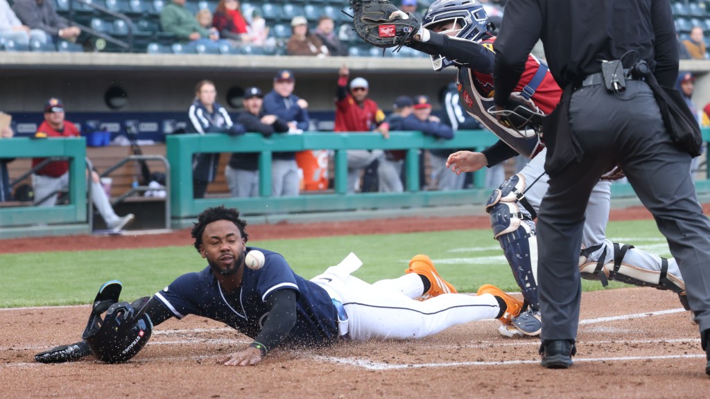 Kahlil Watson slid home safe under the Toledo tag in the 3rd inning Friday