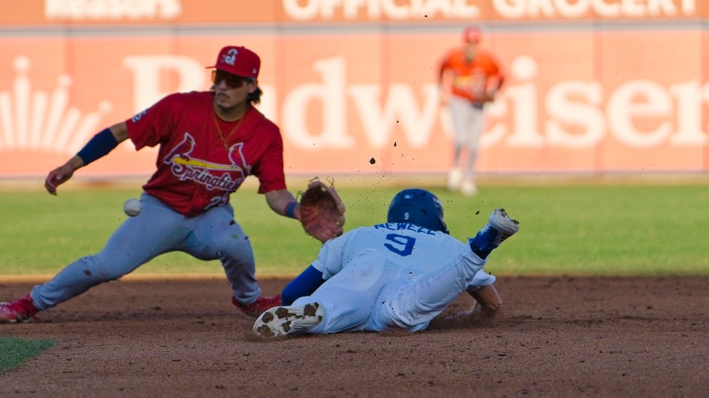 Chris Newell slides safely into second with one of his two stolen bases in Tulsa's 7-6 loss to Springfield on Tuesday night.  Newell also contributed three hits.