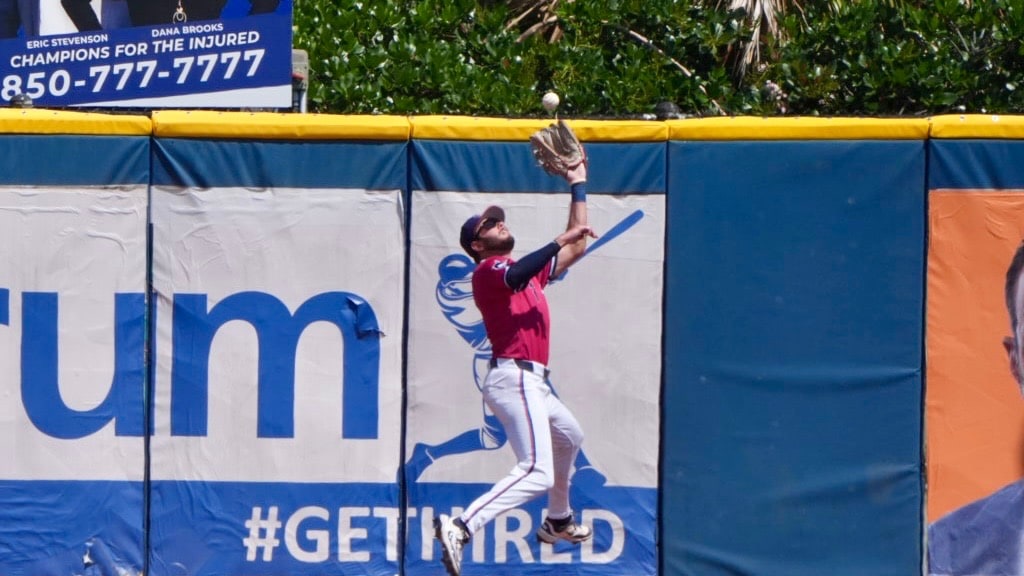 Colby Shade made a leaping catch in Sunday's 2-1 loss to the Shuckers.