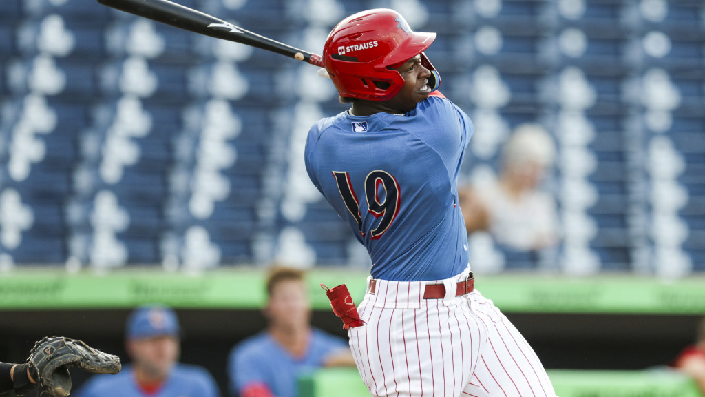 Phillies outfield prospect TJayy Walton connects on a hit during a game for the Clearwater Threshers.