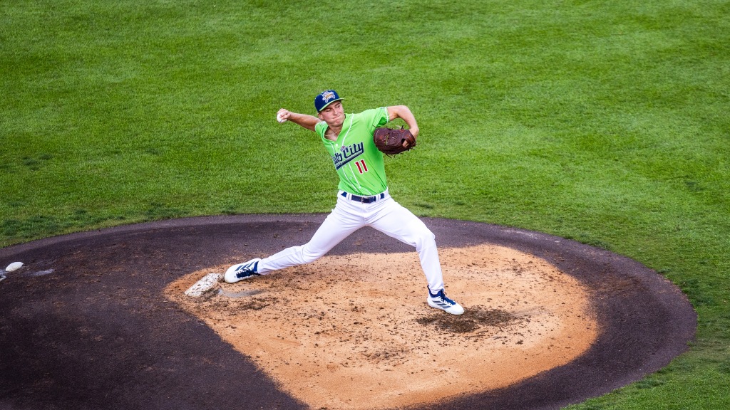 Brock Porter strides toward the plate.