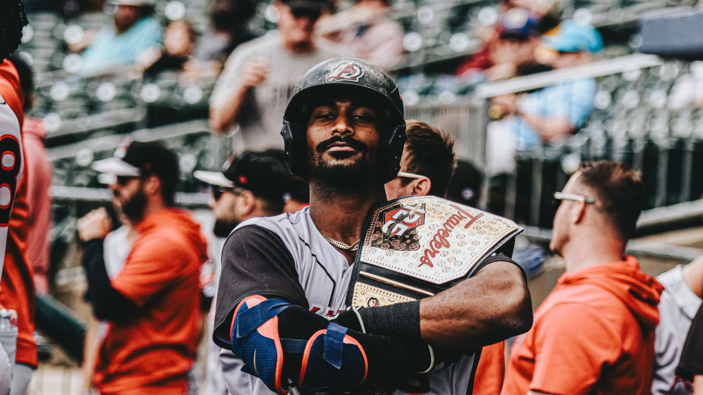 Lazaro Montes posed in the dugout with the Home Run Championship belt after hitting one of the team's four homers on Sunday.