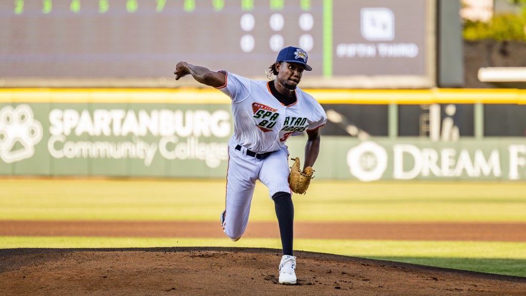 Enrique Segura pitches home.